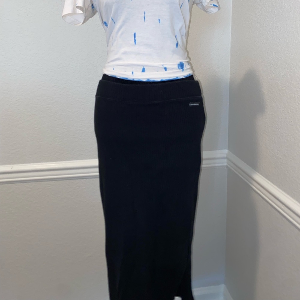 Calvin Klein working girl attire.